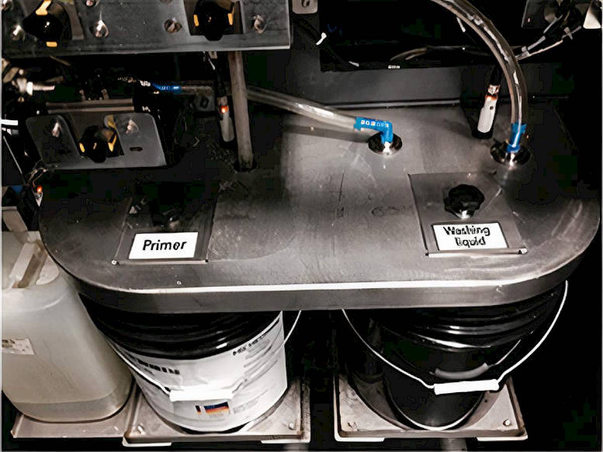 Illustrating the water and primer pail set up.